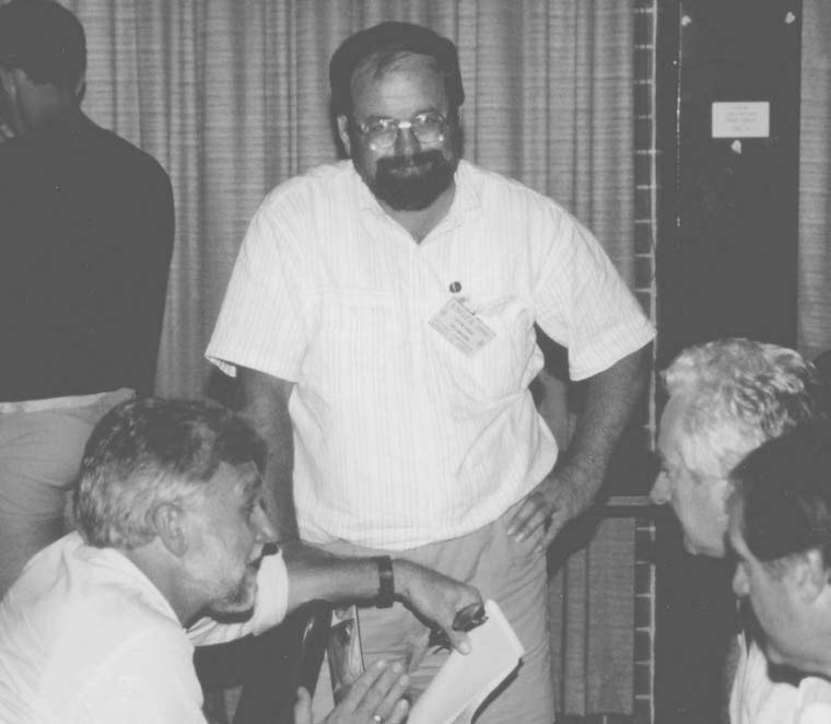 Renowned wildlife and fish photographer Gunther Schmida (standing) listening to the “good” word from Professor Walter Ivantsoff (left) watched by Neil Armstrong and Graeme Heidke