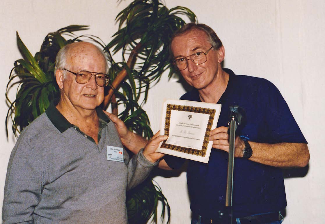 Bruce Hansen presenting Ron Bowman with ANGFA's first Life Membership