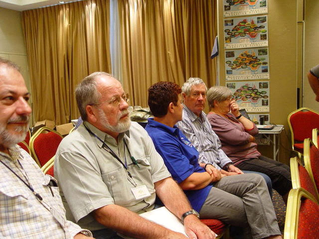 Gunther Schmida and other delegates seated in the audience